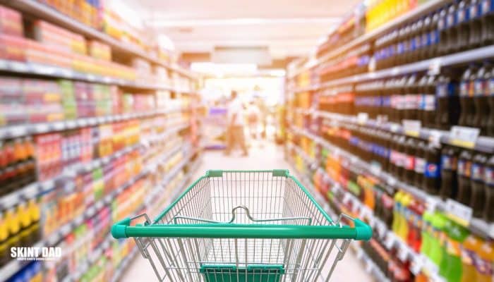 A supermarket aisle scene showing a trolley